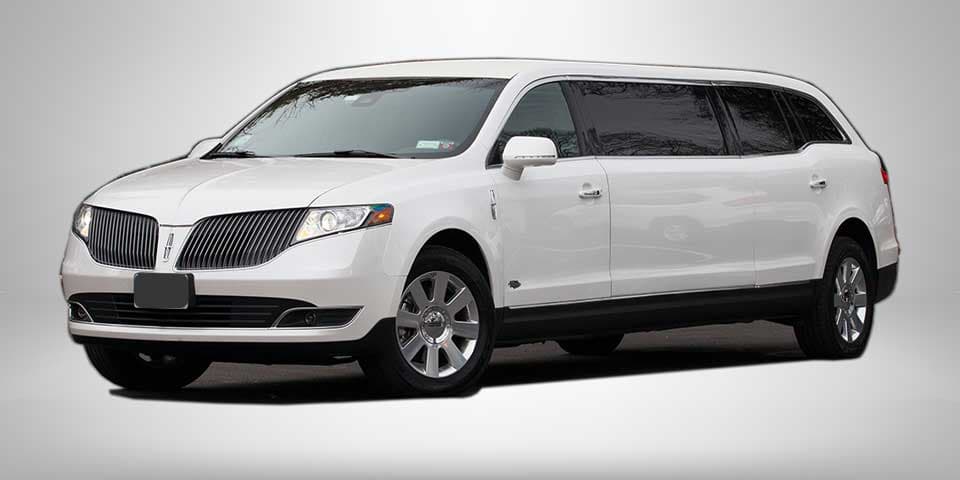 White 6 Passenger MKT Limo: White Stretched Limousine, seats 6, 4 suitcases