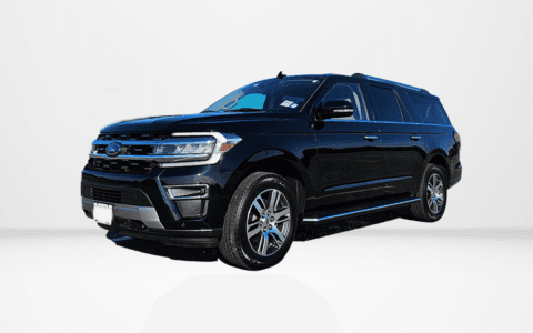 Ford Expedition: Black SUV, seats 5, 4 suitcases