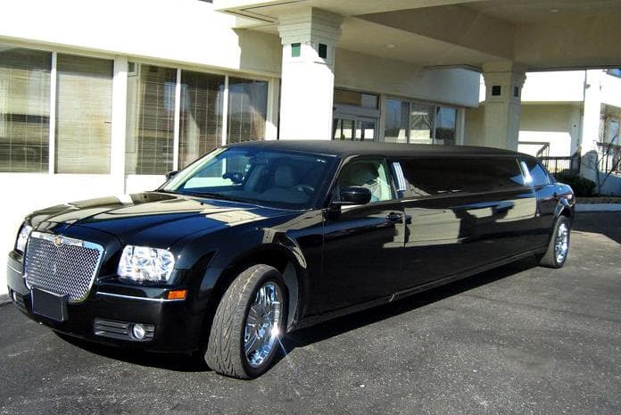 Cadillac Escalade or Ford Excursion SUV limo